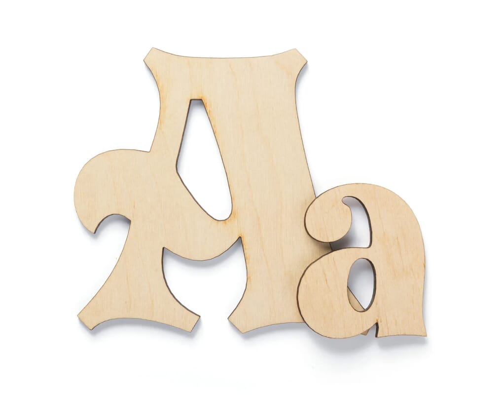 wooden letters isolated at white 2022 12 15 20 03 00 utc scaled 1 - Laserskärning av plywood